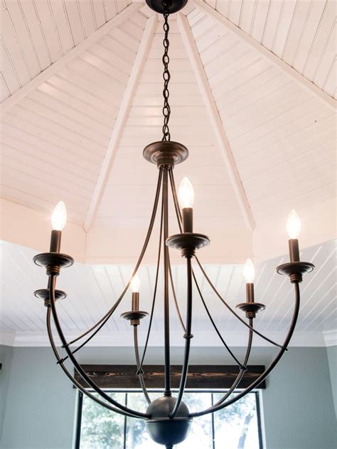 From what i can tell, it looks like the light joanna designed uses some type of conduit or plumber's pipe. Chandelier from Fixer Upper for entryway | Entryway ...