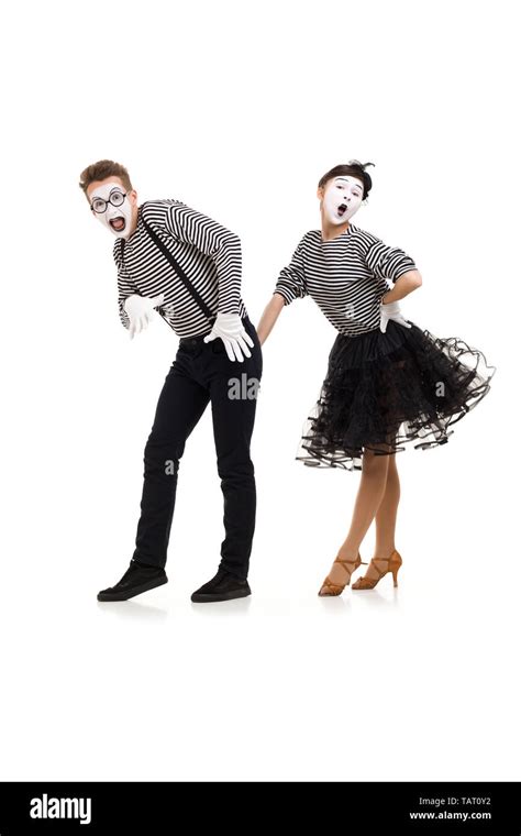Mimes In Striped Shirts Man And Woman Dressed As Actors Of Pantomime