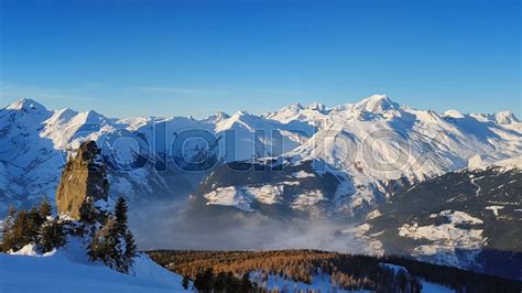 View On A Cloudy Valley In Snowy Stock Image Colourbox