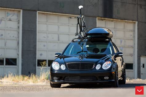 Black Mercedes E Class On Vossen Wheels Fitted With Roof Rack And Bike