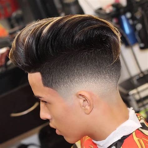 Furthermore, modern men's haircut styles have been focused on a fade with long hair on top. 40 Awesome Low Fade Haircuts for Trendsetters (2021 Guide)
