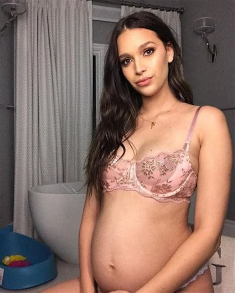 April Love Geary Shows Off Her Baby Bump In Pink Lingerie As She Says