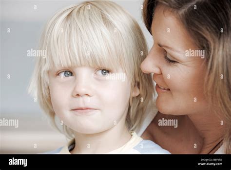 Mother Talking To Her Blonde Son Stock Photo Alamy