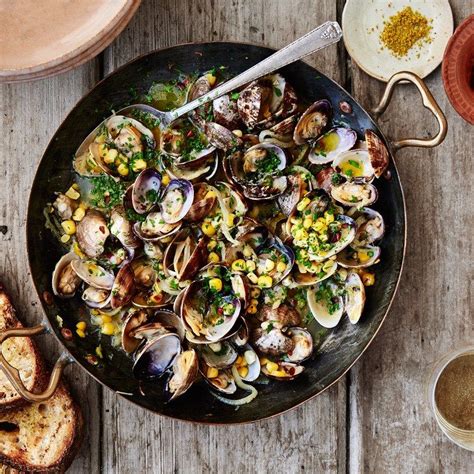 Don't let the garlic burn, so adjust the heat accordingly. Brothy Steamed Clams with Corn | Recipe | Steamed clams, Clam recipes, Recipes