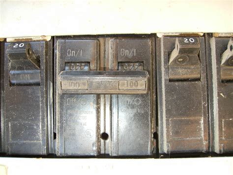 Find the main circuit breaker. Can you tell me if it's 100 or 200 amp by the circuit ...