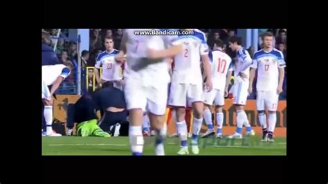 russian goalkeeper akinfeev hit by a flare montenegro vs russia suspended youtube