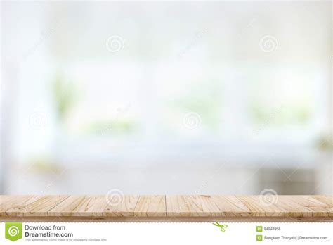 Empty wood table top and blur glass window wall in office. Empty Wood Table Top On Blur Kitchen Window Background ...