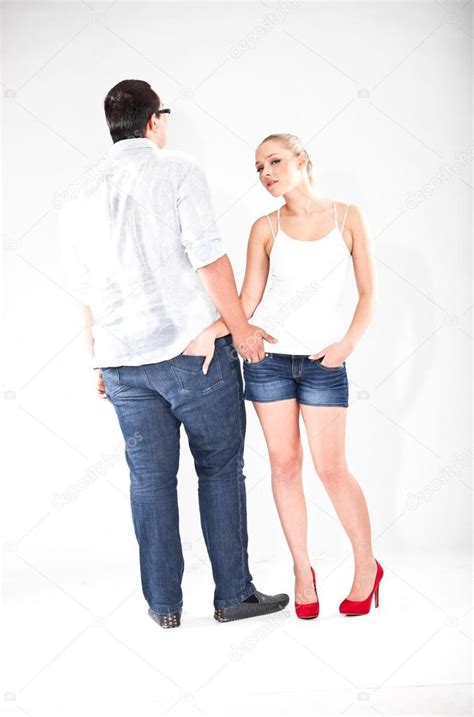 Woman inside is a rigged figure with 3 morphs for the inside of the vaginal canal, 1 for the anus, and 1 for breasts. Girl holding hand in back pocket of boyfriends jeans — Stock Photo © Kryzhov #33633107