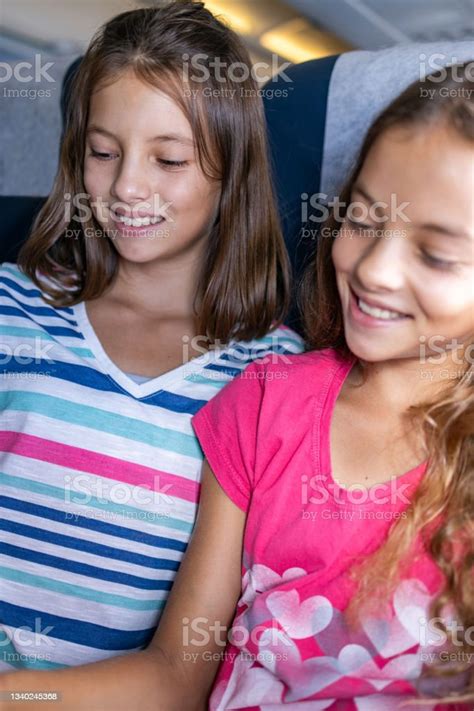 Happy Kids Sitting In Plane Stock Photo Download Image Now 10 11