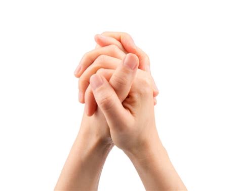 Hands Folded In Prayer Stock Photos Pictures And Royalty Free Images