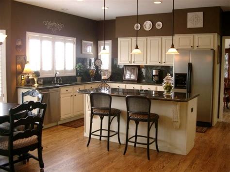 The depth and darkness of the cabinets resembles mahogany or dark cherry wood. Painted Kitchen - Kitchen Designs - Decorating Ideas - HGTV Rate My Space | Brown walls kitchen ...