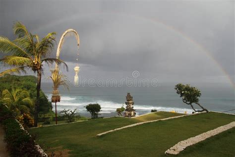 Rainbow Over Uluwatubali Indonesia Stock Photo Image Of Rainbow