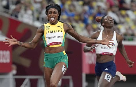 elaine thompson herah wins 200m gold to claim historic sprint double double
