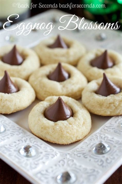 Pretzel kisses are a quick and easy dessert made with just pretzels and hershey kisses, resulting in a place 25 mini pretzels on a cookie sheet. Eggnog Blossoms - Back for Seconds
