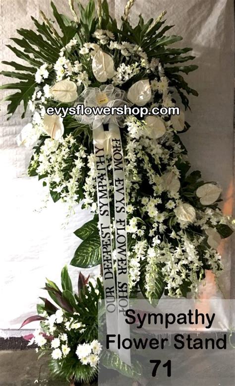Check spelling or type a new query. sympathy flower stand 71- Evys Flowershop I Call 3305174 ...