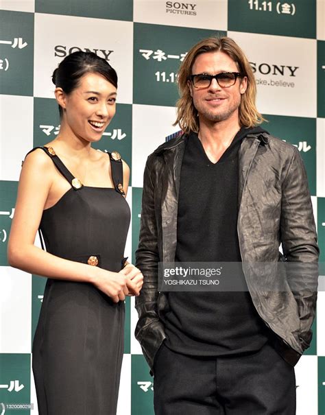 Japanese Actress Kazue Fukiishi And US Actor Brad Pitt Attend A Press