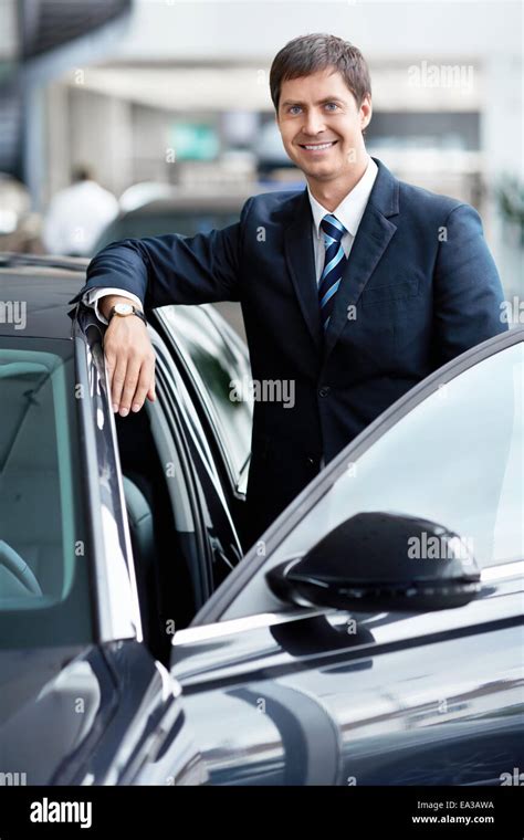 Businessman Near Cars Stock Photo Alamy