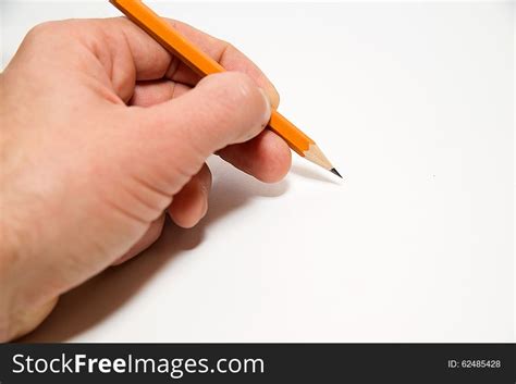 Men S Left Hand Holding A Pencil On Over White Free Stock Images