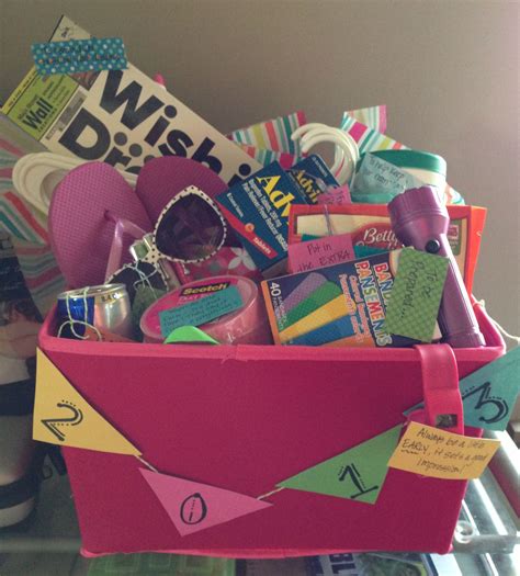 Why settle for a boring traditional gift when you could show your pride in a more unique and colorful way? Graduation gift basket - college survival and tips basket ...