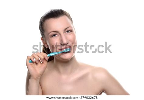 Attractive Naked Woman Brushing Her Teeth Stock Photo