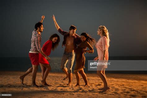 Beach Party At Night High Res Stock Photo Getty Images