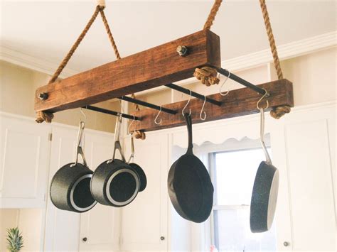 This wooden rack from cooks standard has six wood tracks—which creates an additional shelf for more pots and pans, or any other kitchen supplies you. Rustic Wood Pot Rack by OlsenWoodcraft on Etsy | Colgantes ...
