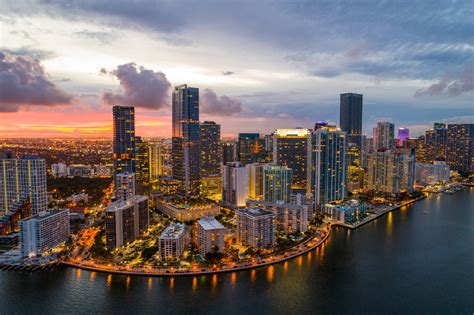 What companies run services between downtown miami, fl, usa and miami beach, fl, usa? Tourist Attractions in Miami Florida Brickell Downtown - Flying and Travel