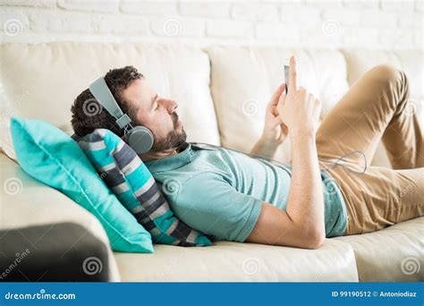 Chilling On Social Media Stock Photo Image Of Home Sofa 99190512