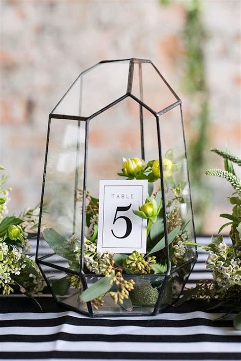 Maybe you would like to learn more about one of these? 51 Unique Table Number Ideas for Wedding Receptions (and DIYs)