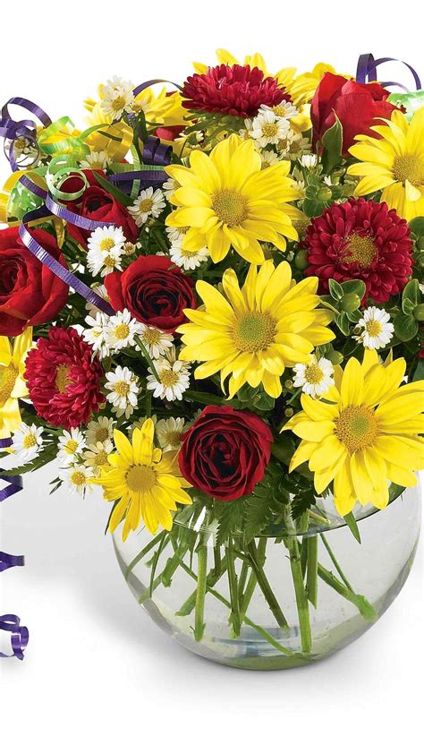 Check spelling or type a new query. Bouquet of red, yellow and white flowers in the glass vase ...