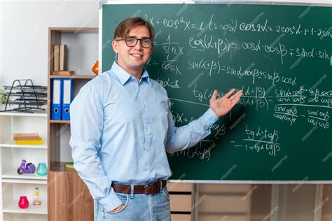 Free Photo Young Male Teacher Wearing Glasses Happy And Positive