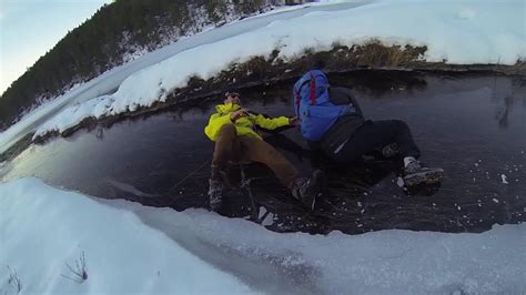 Two Friends Fall On Frozen Lake Jukin Licensing