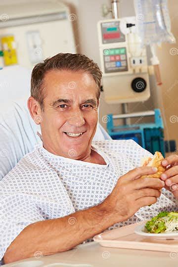Male Patient Enjoying Meal In Hospital Bed Stock Image Image Of