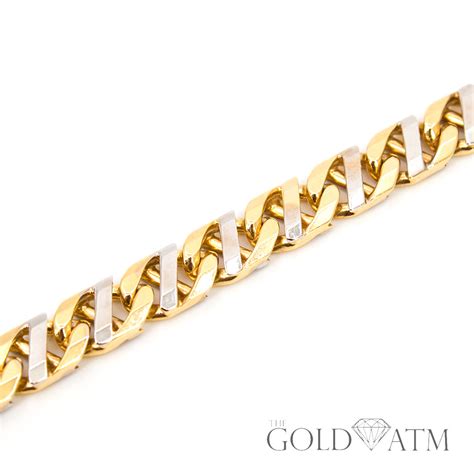 Some are plated, fake, stamped wrong… test them to see what you're sending in. 10K Combination Yellow and White Gold Cuban Link Chain (20 ...