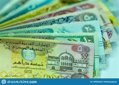 Close Up United Arab Emirates Currency Dirhams And Fils Dubai Abu