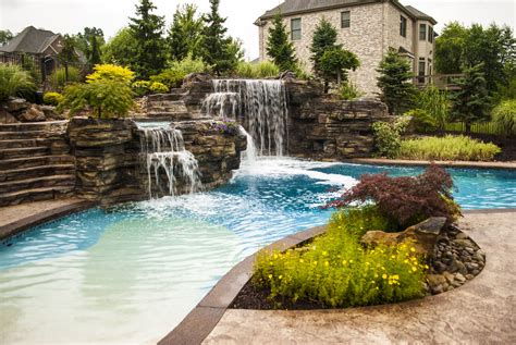 Breathtaking pool waterfall design ideas pool waterfall natural pool backyard pool. Multiple Waterfalls on a concrete swimming pool. The pool ...