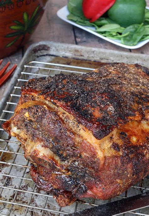Place the pork, fat side up on a rack in a roasting pan. Crispy Skin Slow Roasted Pork Shoulder | Recipe | Slow ...