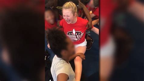 Cheerleading Coach Fired After Forcing Babe Into Split