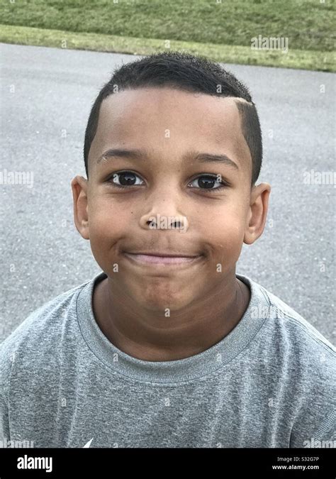 Little Boy Making A Silly Face Stock Photo Alamy