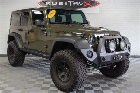 16 for sale starting at $45,480. Pre-Owned 2016 Jeep Wrangler Rubicon Unlimited Tank Green