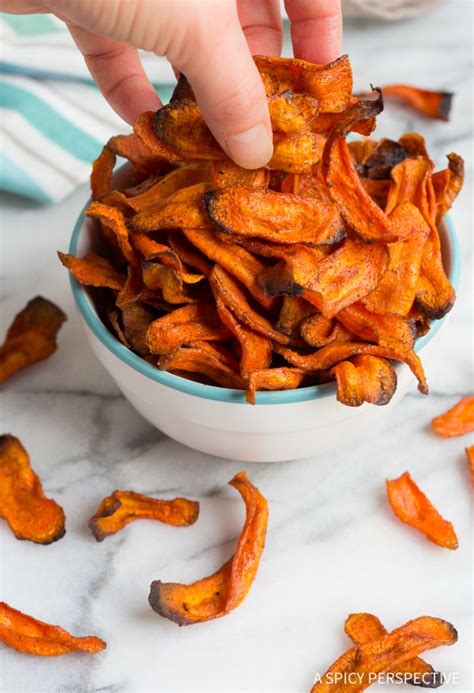 But, for maximum crispy crunch, i recommend arranging your carrot slices on a wire baking rack, if you have one. Baked Carrot Chips #ASpicyPerspective #healthy | Baked ...