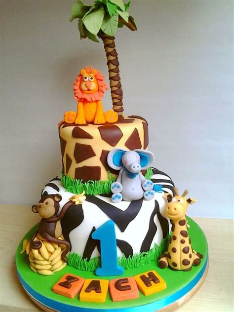 We've pulled together a massive list of original 1st birthday themes for both girls and boys. Jungle theme 1st birthday cake, zebra and giraffe print ...