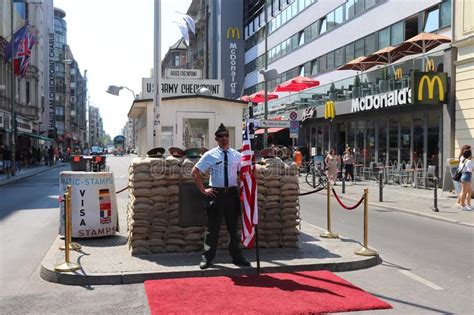 It shows photographs and fragments of the separation of germany. Checkpoint Charlie And The Museum Haus Am Checkpoint ...