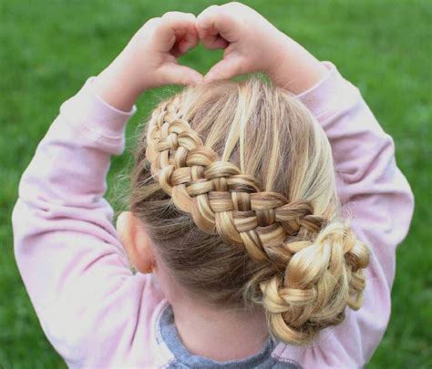 This kid has been decorated with thick cornrows braids and the braids are tied into two beautiful knots by the two sides of the head. 40 Pretty Fun And Funky Braids Hairstyles For Kids