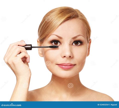 Beautiful Woman Applying Mascara On Her Eyelashes Isolated Stock Photo