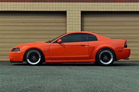 Every used car for sale comes with a free carfax report. This 2004 Competition Orange Cobra Mustang Was Built to ...