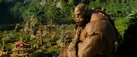 Orc warriors fleeing their dying home. Warcraft Movie Images Feature Orcs, Humans, and a Hybrid ...