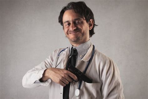 Scary Doctor With A Gun Coming Out Of His Pocket Stock Photo Image Of
