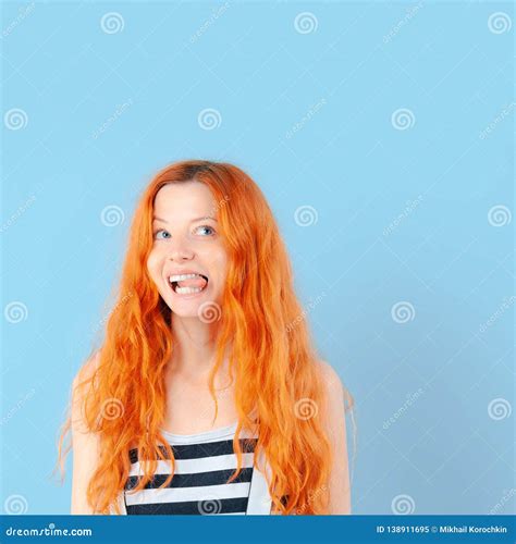 Redhead Girl Shows Tongue And Smiles Stock Image Image Of Person Concept 138911695