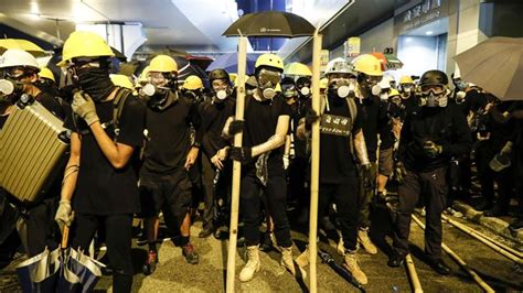 Police Fire Tear Gas Rubber Bullets At Hong Kongers Protesting Triad